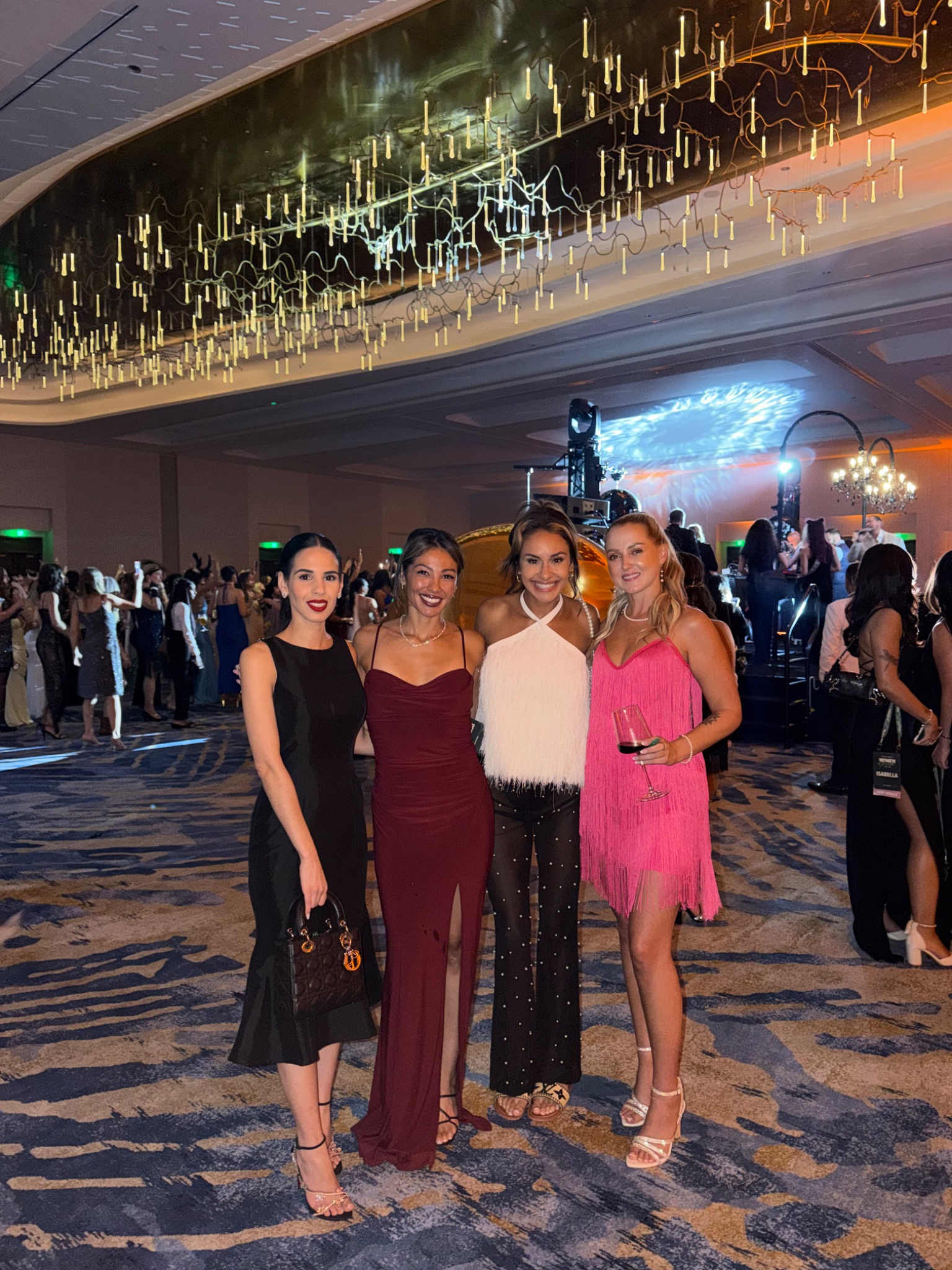 Founder networking with women at a professional event
